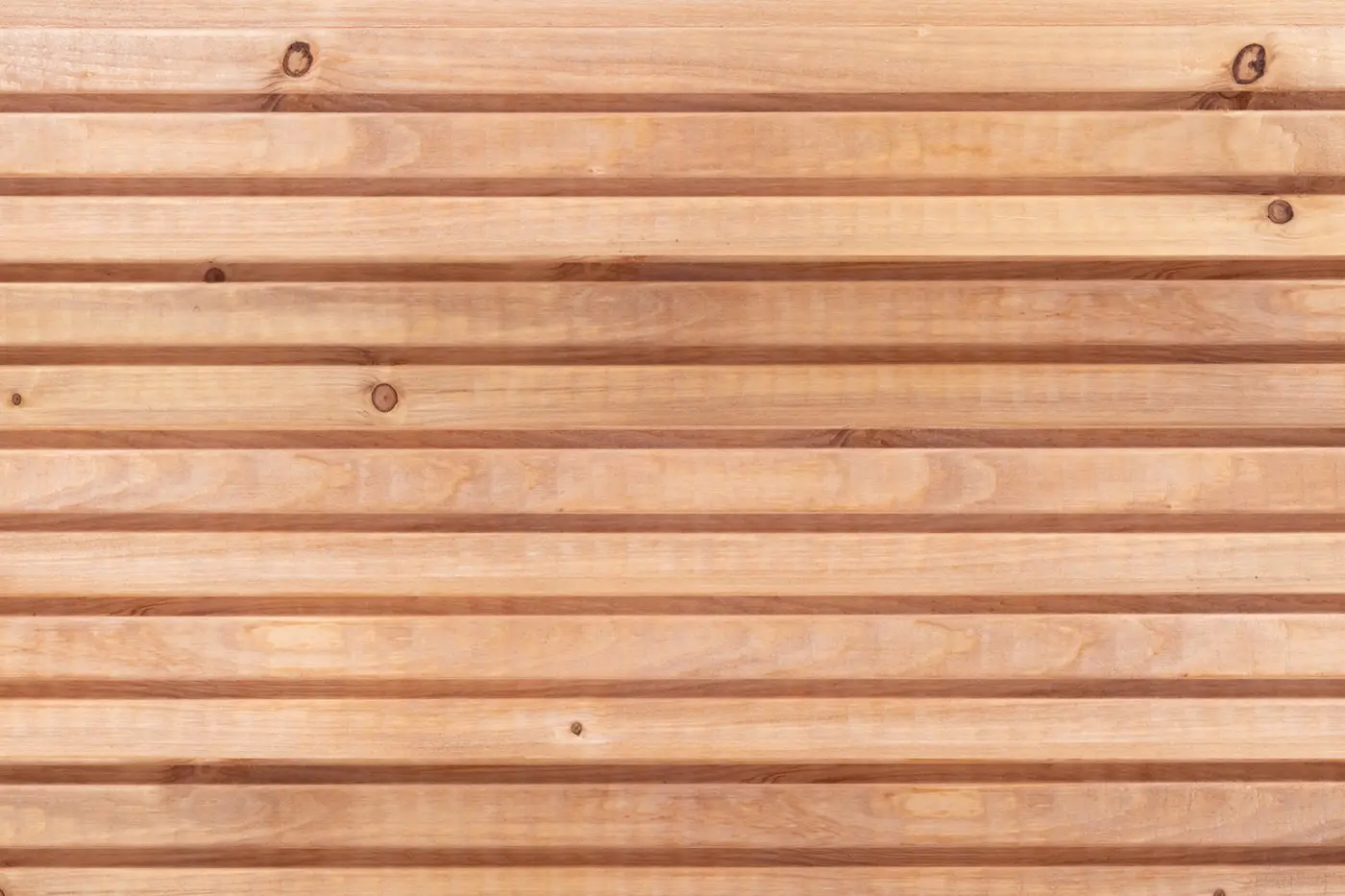 Ecowood cladding board triple slatted profile showing horizontal wood slats and natural grain texture.