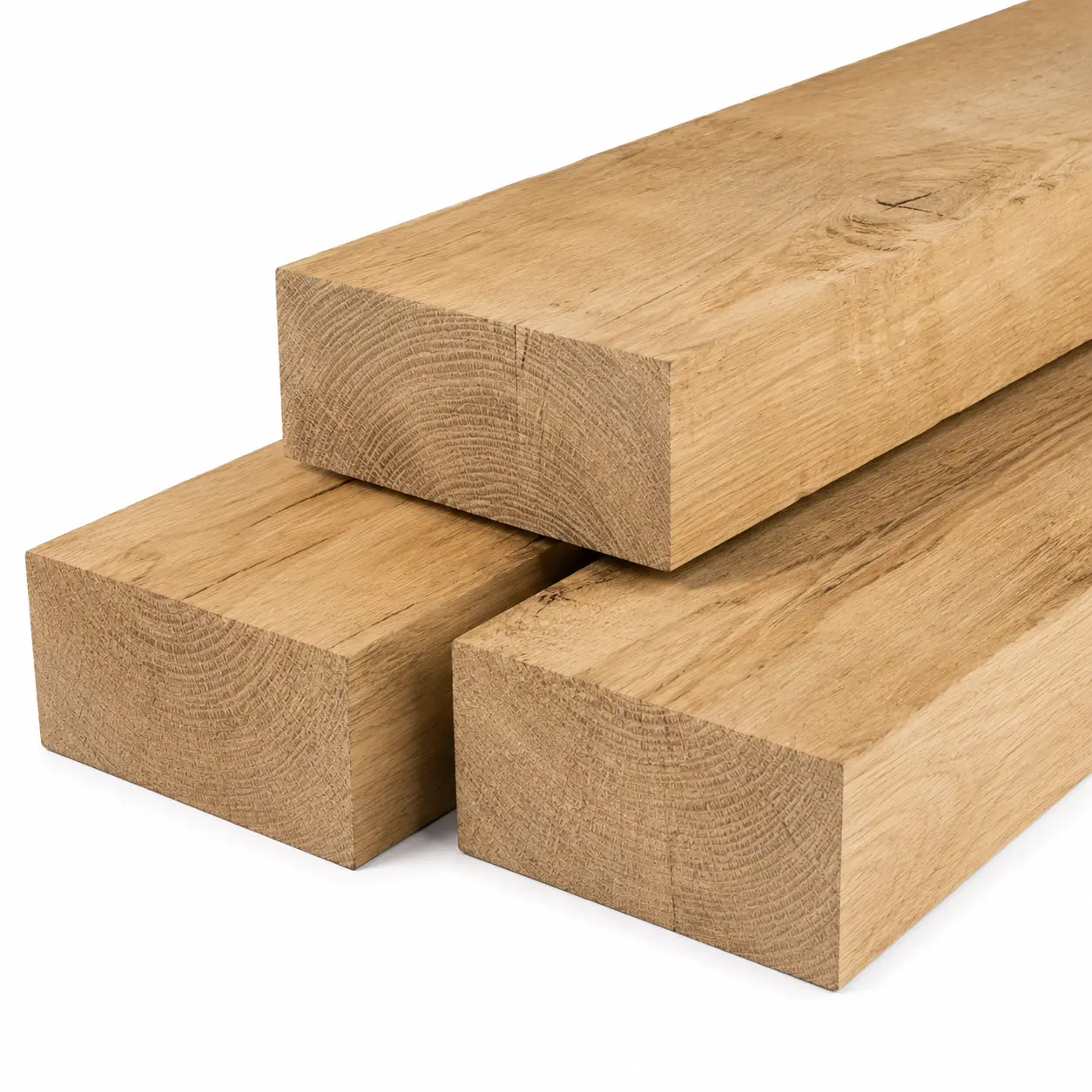 Stack of three durable Oak railway sleepers showcasing natural light brown wood grain on white background.