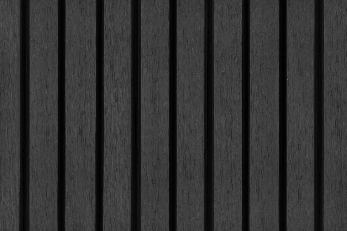 Flat, full-frame texture view of installed PuraTech 55 double profile composite cladding panels in Ebony Black showing the uniform slatted design and fine vertical wood grain.