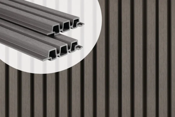 PuraTech 30 triple profile composite cladding boards in Dark Grey showcasing the hollow cross-section profile against an installed slatted wall panel.