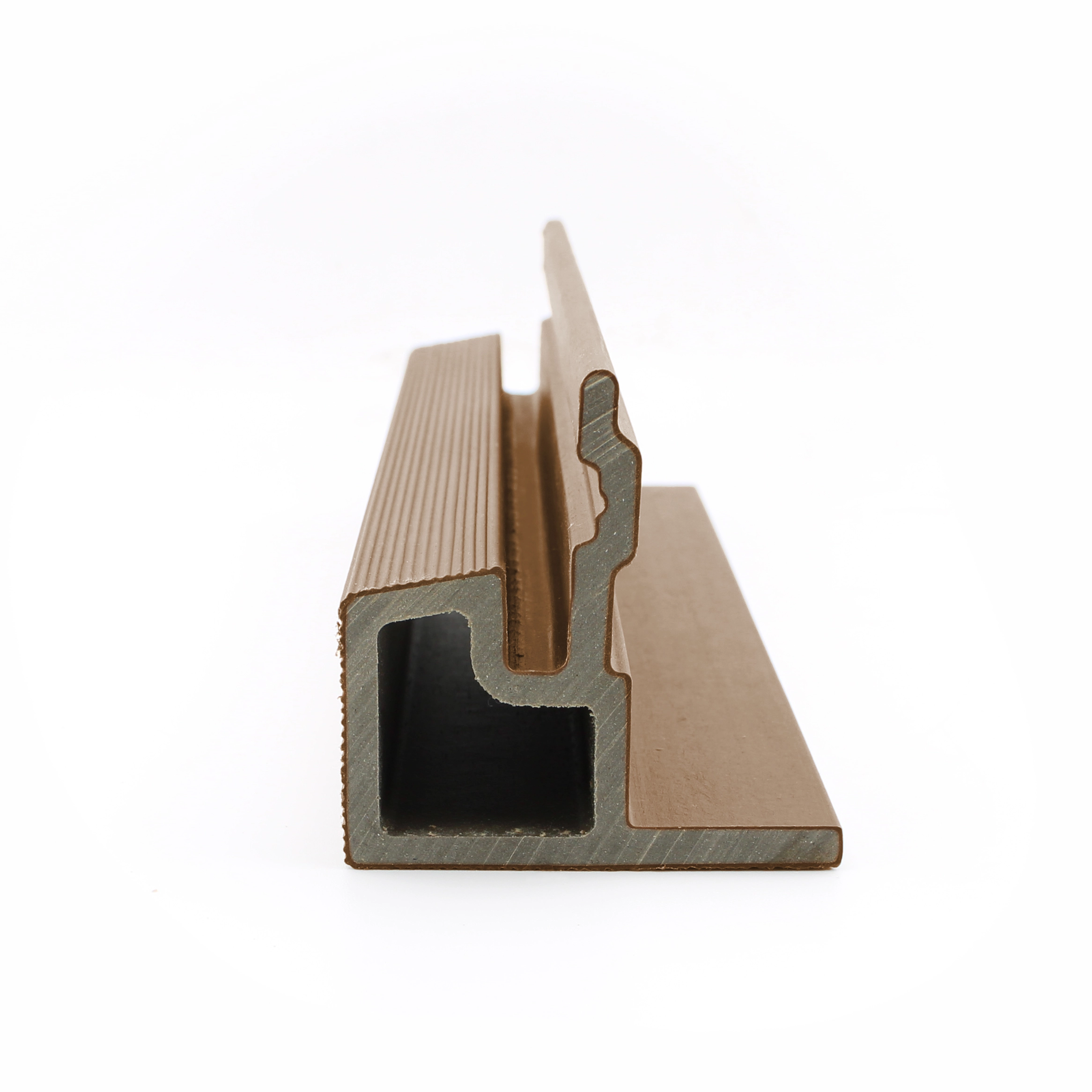 Profile view of a PuraTech composite end trim section piece in a teak finish showing its interlocking structural design against a white background.