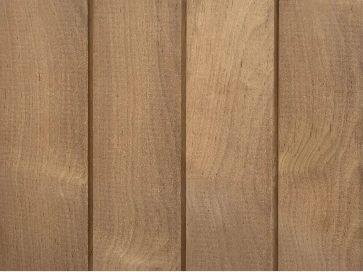 Flat, full-frame texture view of installed natural Alder door frame wood panels showcasing prominent organic grain patterns and rich tonal variations.
