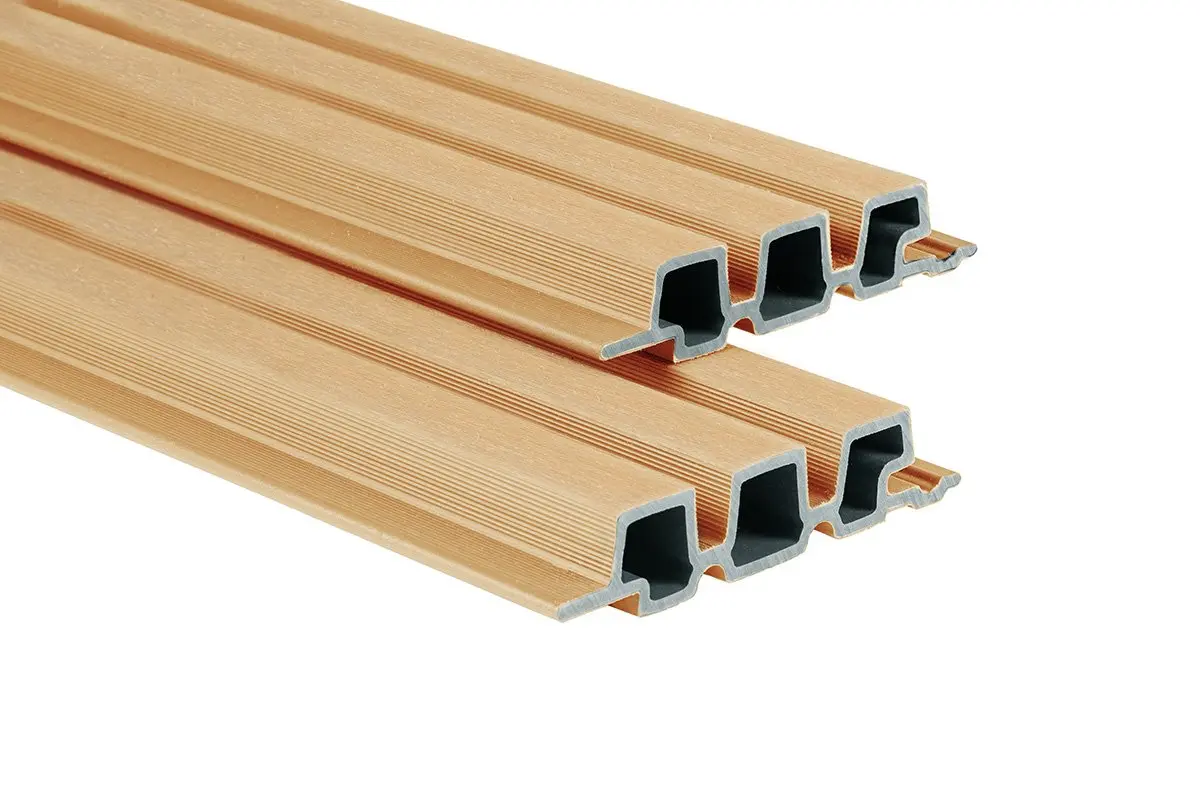 PuraTech 30 composite cladding boards in a cedar finish showing a detailed cross-section of the triple profile slatted design against a white background.