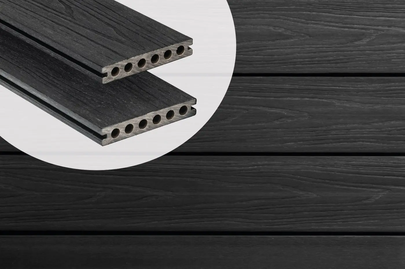 PuraShield round hole co-extruded composite decking boards in Ebony Black showing cross-section profiles against an installed deck surface.