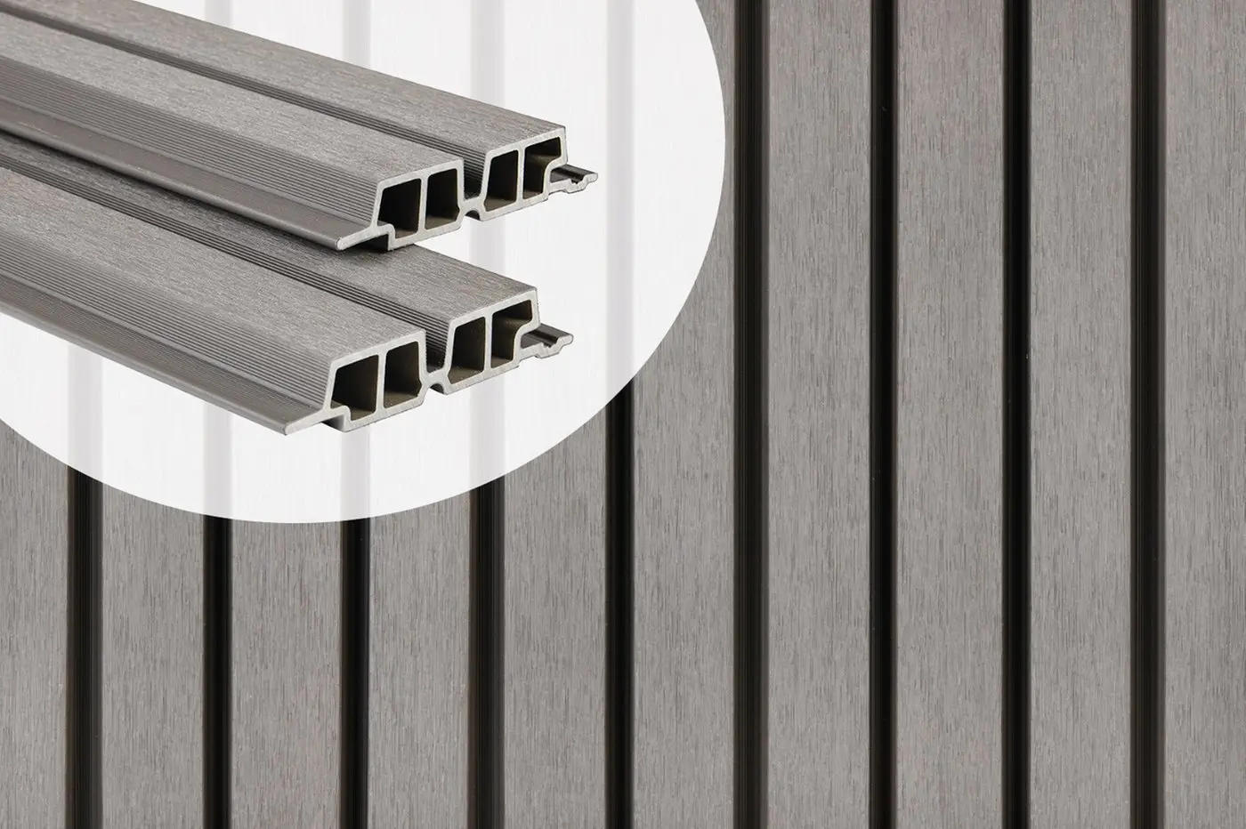 PuraTech 55 double profile composite cladding boards in Light Grey showcasing the hollow cross-section design against an installed slatted wall panel.