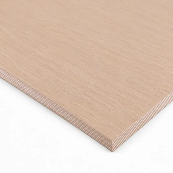 Close up corner view of a 19 mm Oak veneered Birch Plywood sheet showing layered structural edge and smooth grain surface.