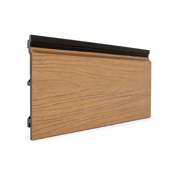 Side angle view of a natural cedar finish PuraShell Co-Extruded T&G Composite Cladding board showing its textured surface and interlocking profile.