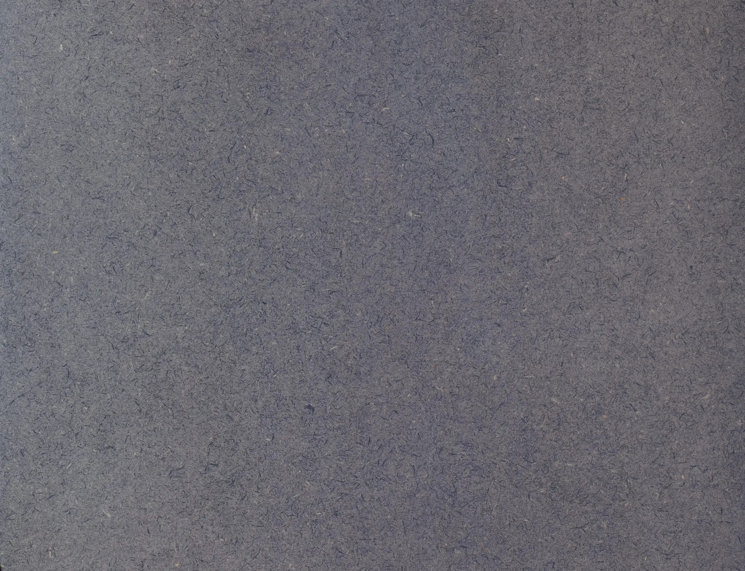 Close-up surface texture view of a 19mm Valchromat Throughout Light Black Coloured Moisture Resistant MDF sheet measuring 2440x1220mm.