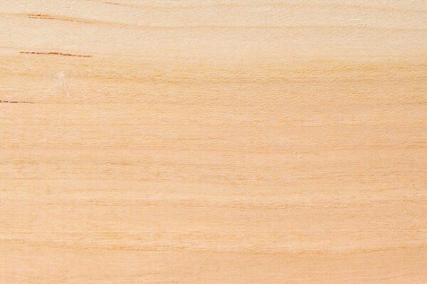 American cherry hardwood grain detail square showing warm reddish brown colour and fine straight grain