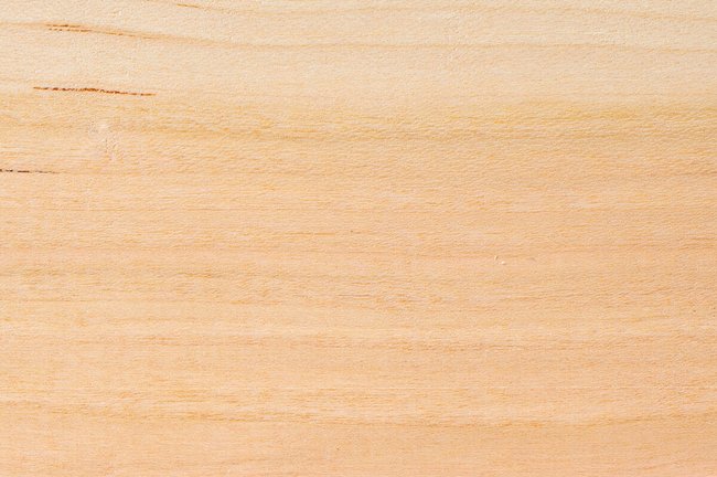 American cherry hardwood grain detail square showing warm reddish brown colour and fine straight grain