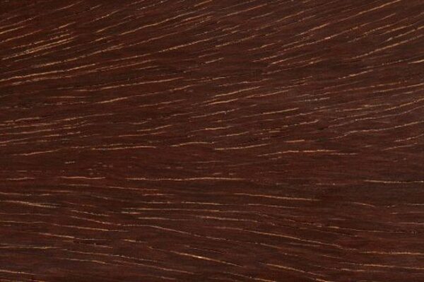Ekki (azobé) hardwood grain detail square showing dense dark red-brown heartwood with interlocked grain and pale vessel lines