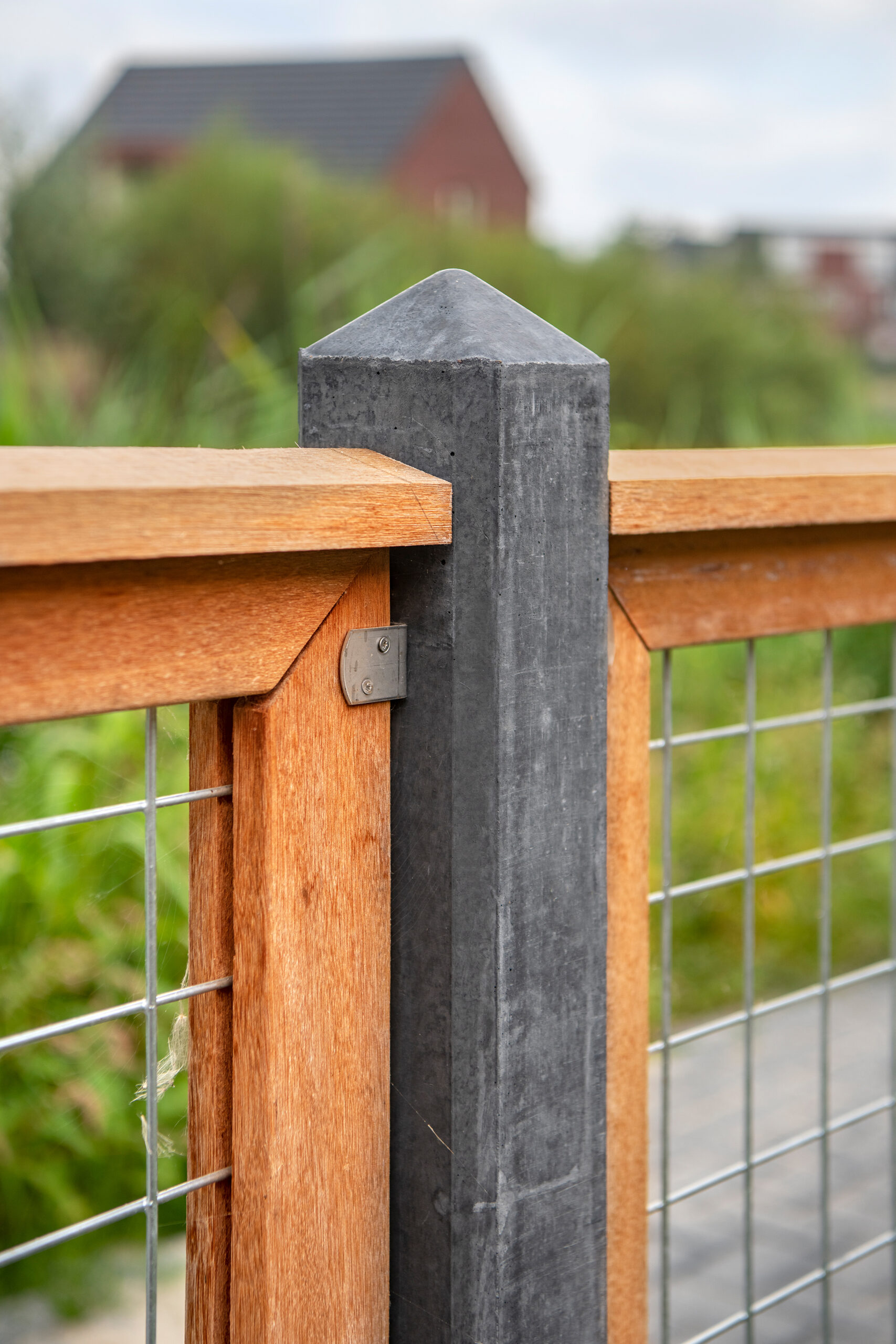 Rebated underside of hardwood fence panel capping strip