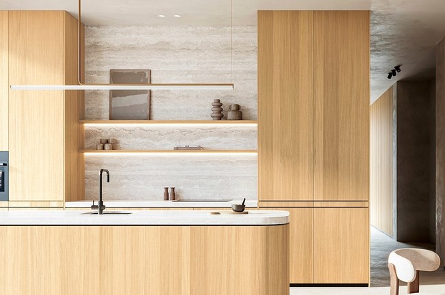 Querkus Adagio oak veneered MDF panels used as full-height kitchen cabinetry and a curved island front in a minimalist interior